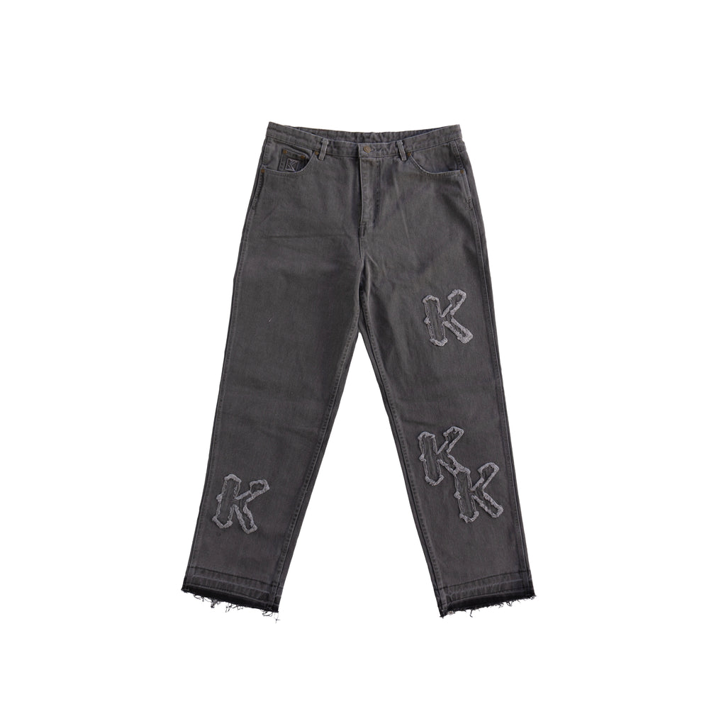KARL KANI DISTRESSED LOGO JEANS – GREY