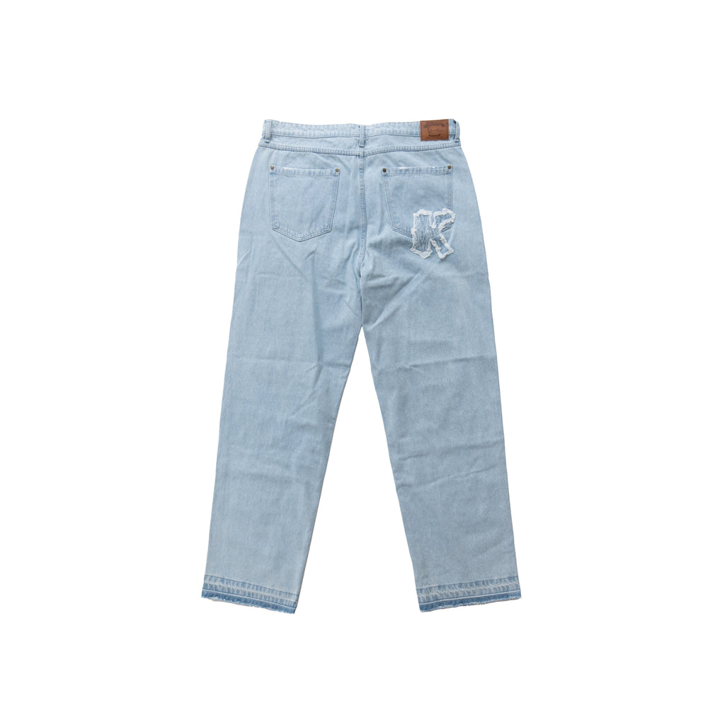 KARL KANI DISTRESSED LOGO BAGGY JEANS – LIGHT BLUE
