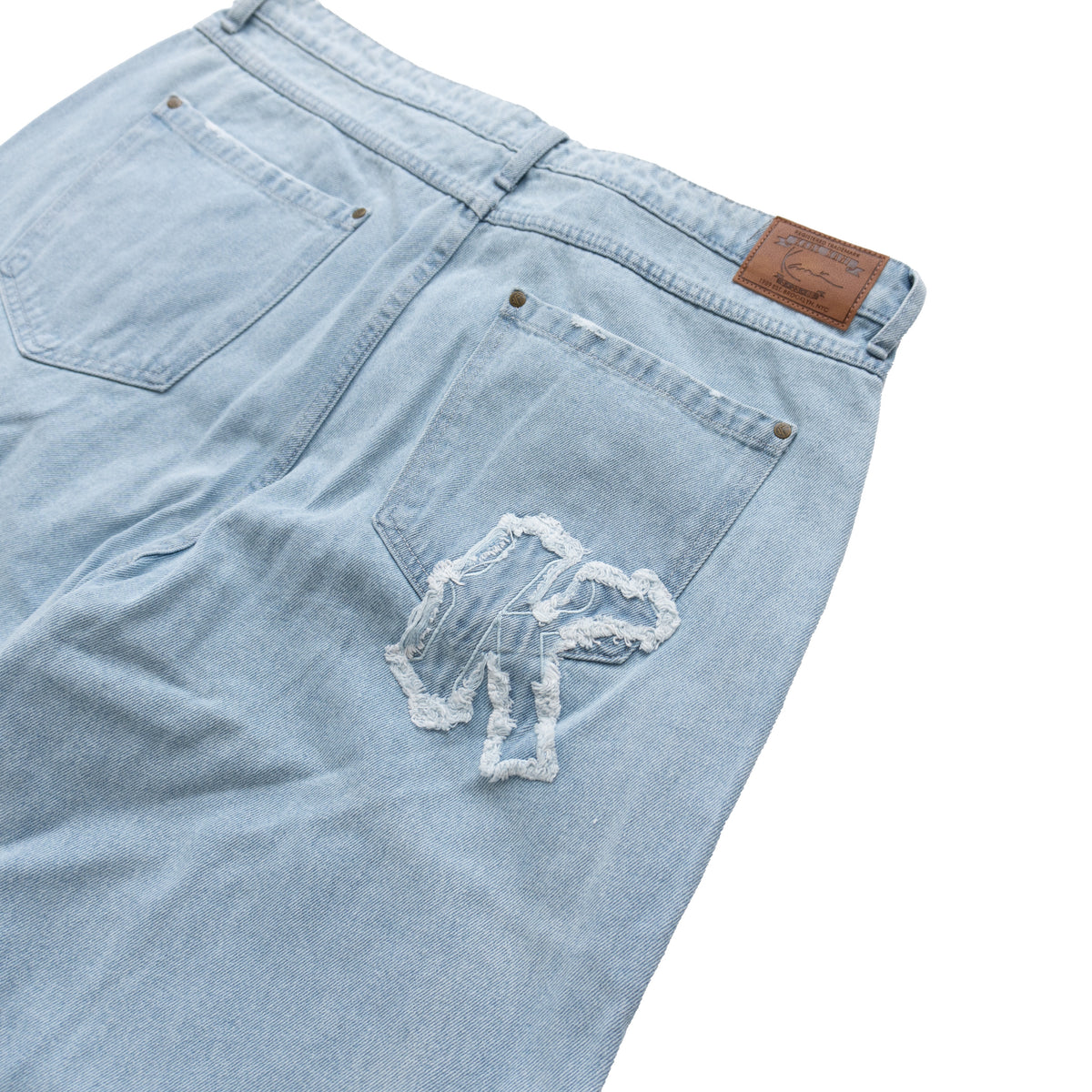 KARL KANI DISTRESSED LOGO BAGGY JEANS – LIGHT BLUE